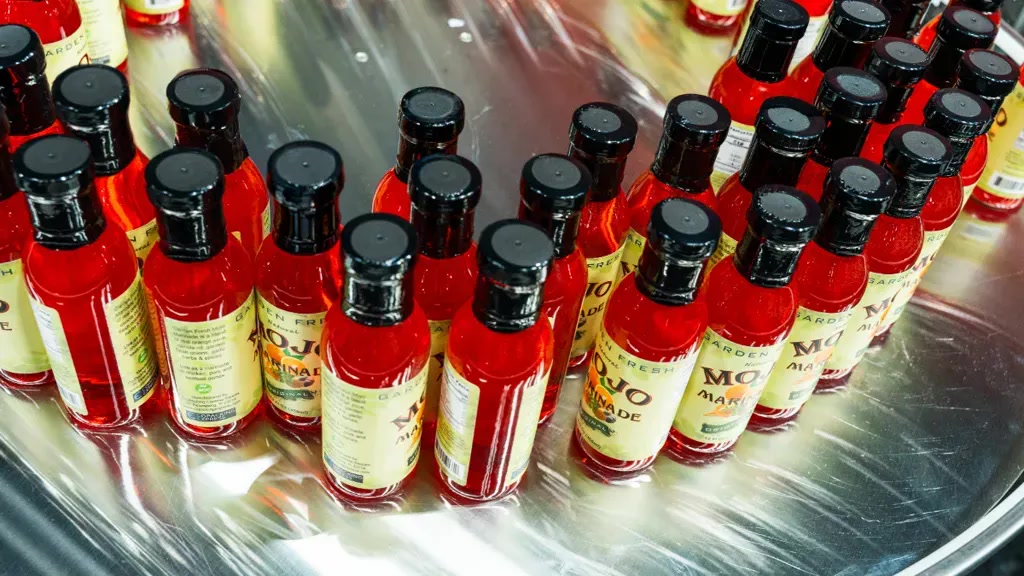 Co Packing Express bottled products moving through a production and packaging workflow